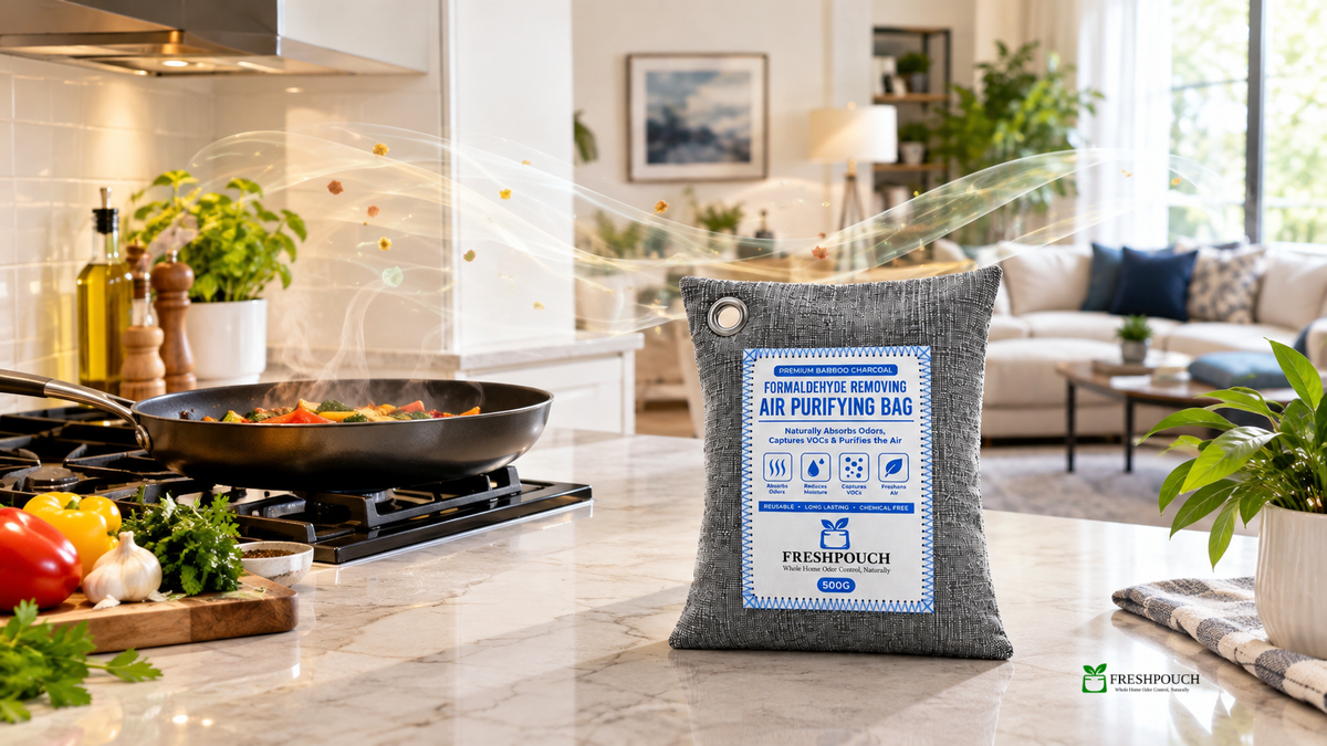 FreshPouch bamboo charcoal air-purifying bag displayed on a modern kitchen countertop beside a frying pan and fresh ingredients, illustrating a fragrance-free approach to adsorbing lingering cooking odors. 