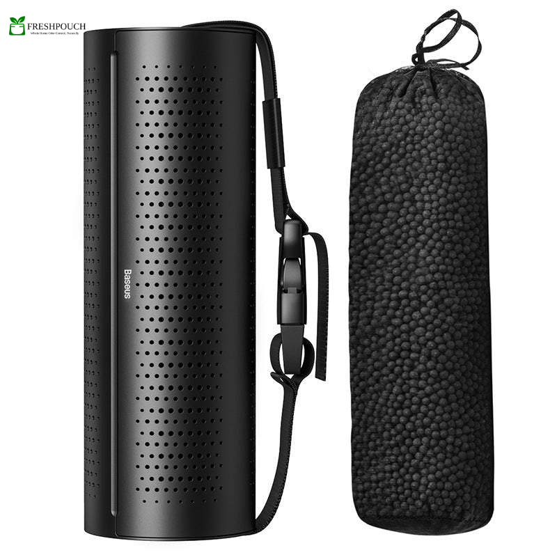 Black portable air purifier with carrying strap and mesh bag on a white background