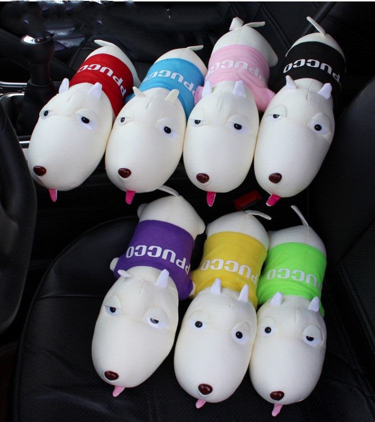 Set of cartoon dog-shaped car air fresheners in various colors on a car seat.
