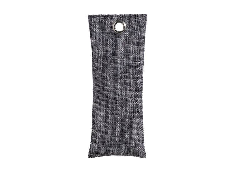 Textured gray fabric strip with a circular hole on a white background